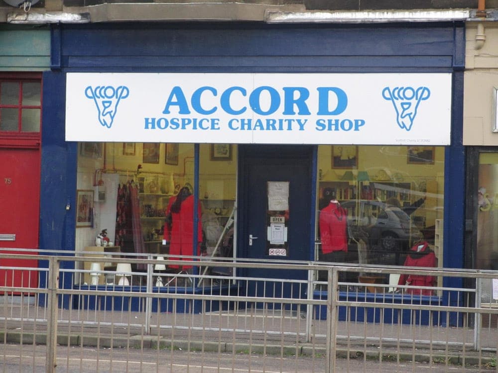 An ACCORD charity shop with its old blue and white fascia, before the rebrand