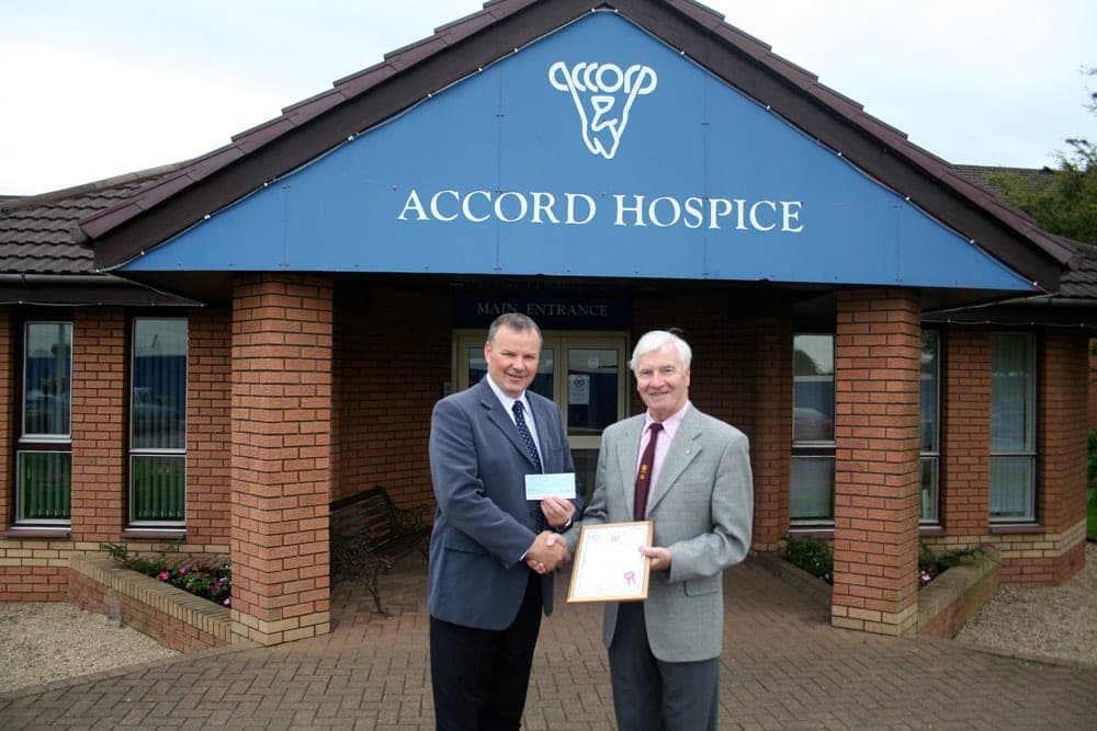 The old blue ACCORD Hospice entrance sign, before the rebrand