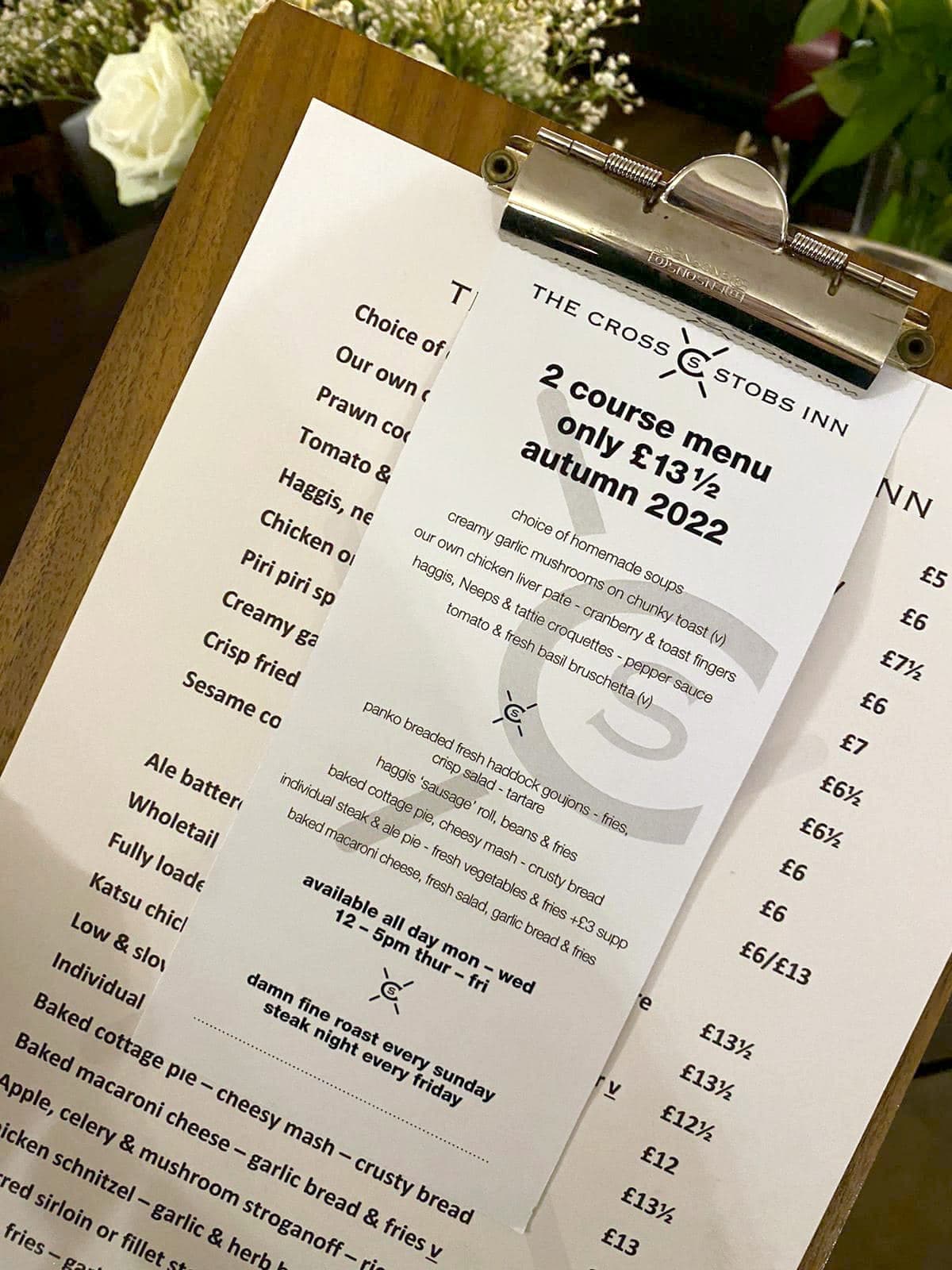 Cross Stobs Inn two-course menu on a clipboard