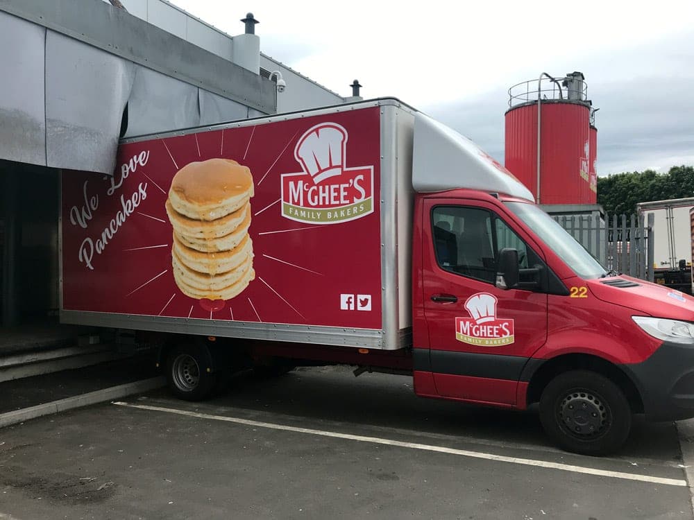McGhee’s lorry with a giant stack of pancakes and the words We love pancakes